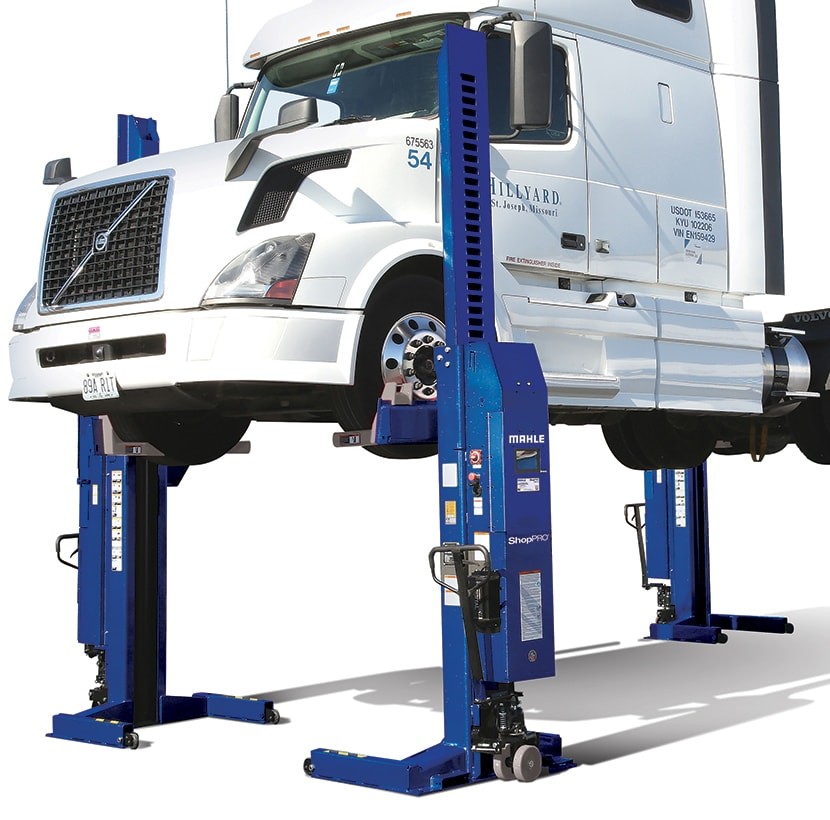 ShopPRO wireless mobile column lifts lifting a heavy-duty truck, these lifts can lift up to 148,000 lbs. 